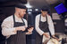 head chef speaking to chef in the kitchen 