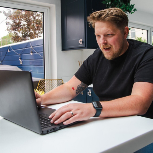 colleagues at a laptop