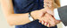 Businessman and woman shake hands as hello in office, close up shot. Concept for empowering women in finance
