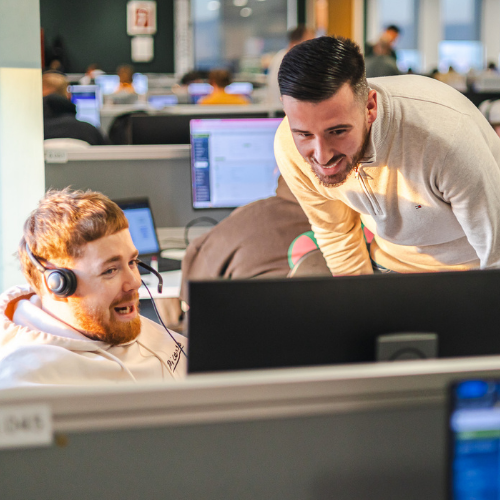 colleagues at a laptop