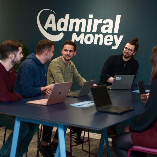 colleagues at a laptop