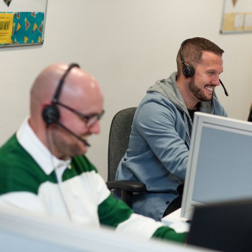 colleagues at a laptop