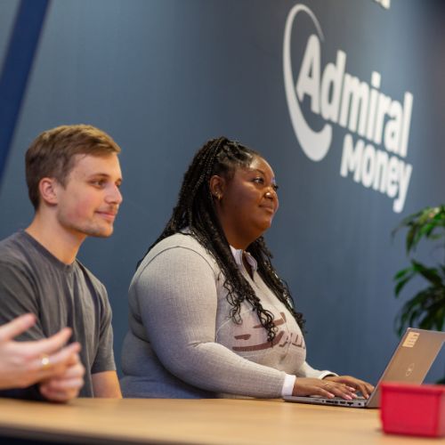 colleagues at a laptop