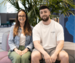 Meg and Oli, siblings and colleagues at Admiral, sat in the Admiral office