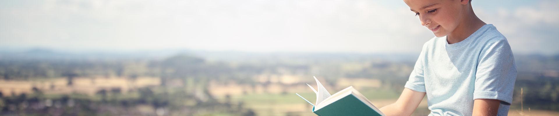 school boy reading