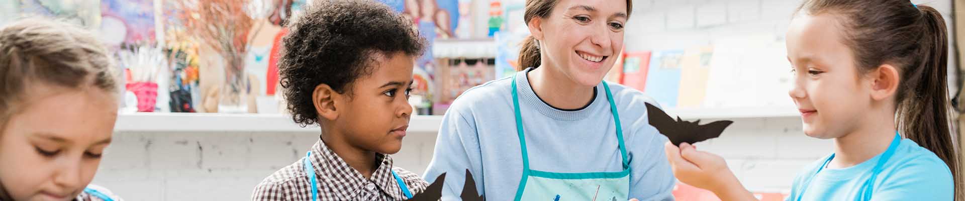 Halloween teacher sharing scary stories