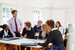 Pupils listening to teacher in classroom