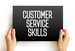 Customer Service Skills text on card, concept background