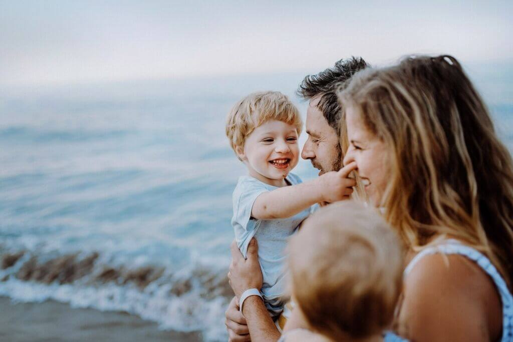 a family by the beach