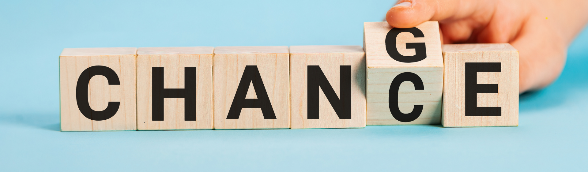 Wooden blocks with the word 'change' on it