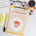 clipboard with the word 'internship' on it