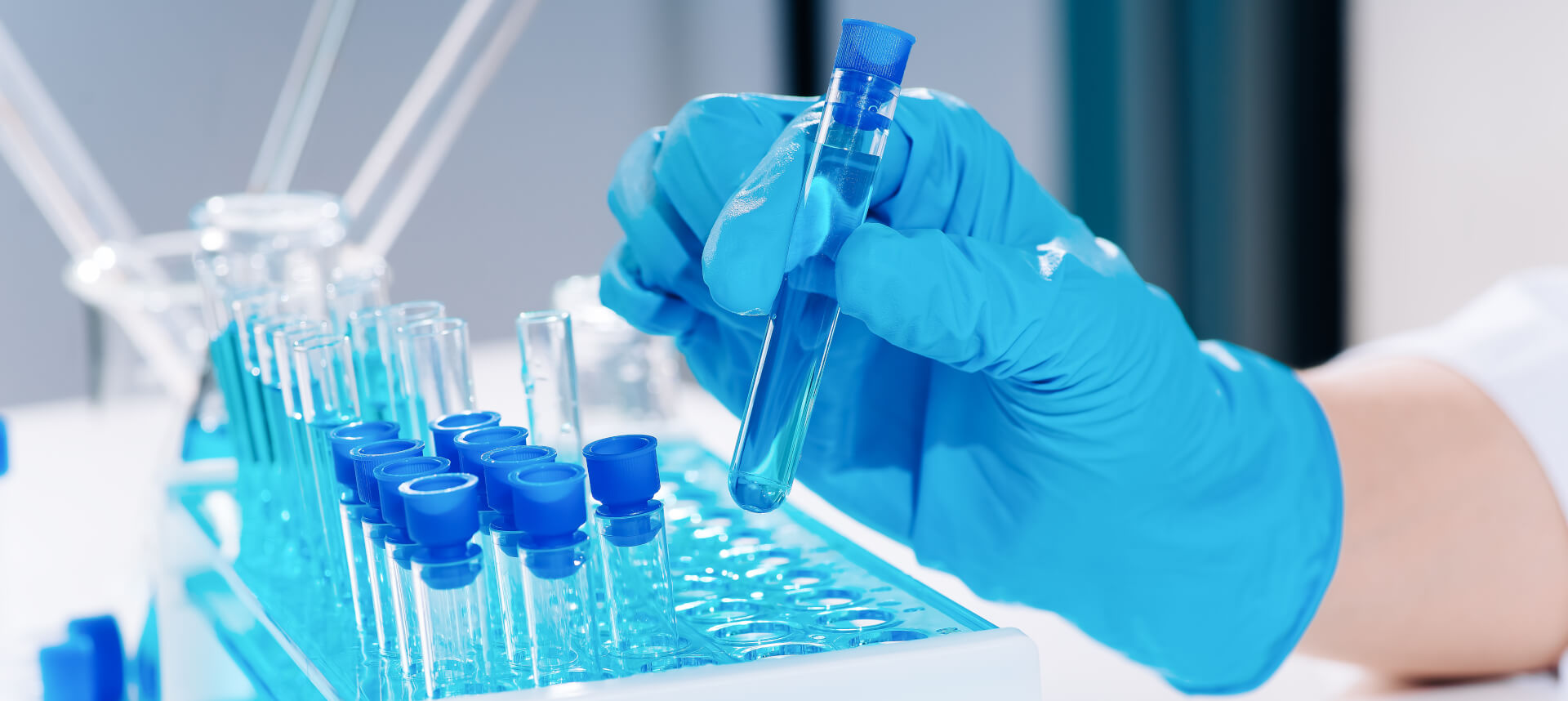 clinical researcher holding a test tube