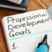 Professional development goals written on a notebook