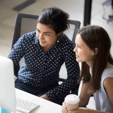 employees looking at computer