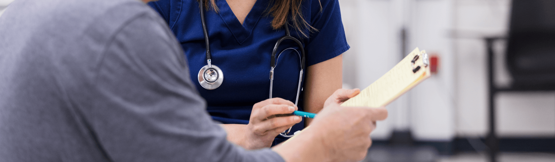 Medic with patient and consent form