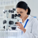 Female scientist with microscope