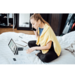 Female using a laptop to search for jobs