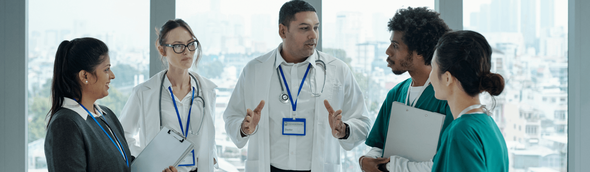 5 x medial professionals in an office