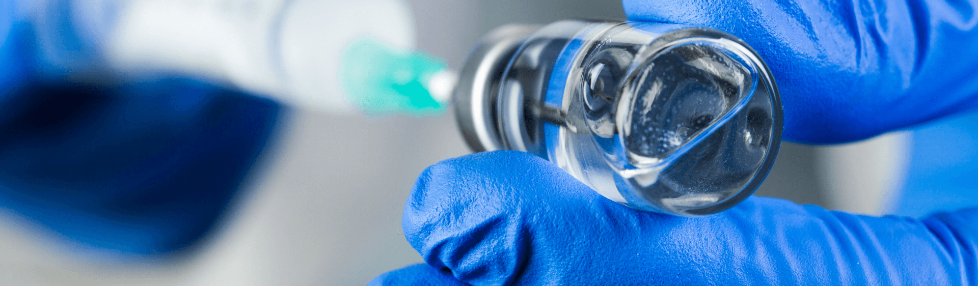 Needle going into vial