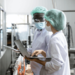 Male and female auditing a manufacturing facility