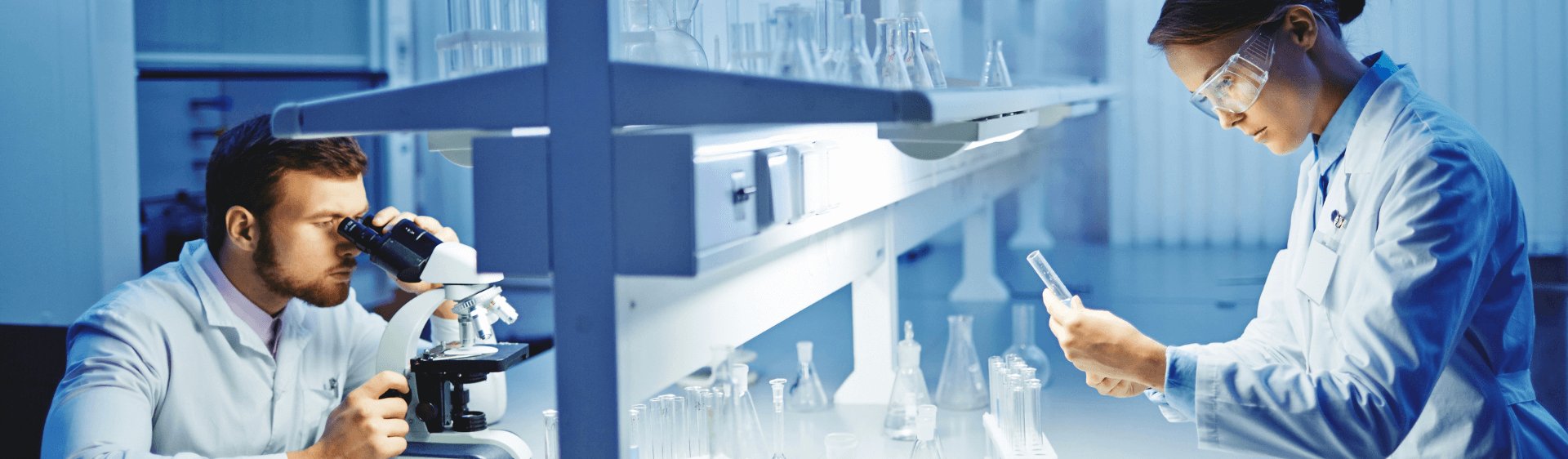 male and female scientist in lab