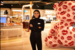 image of harrods retail manager smiling at the camera