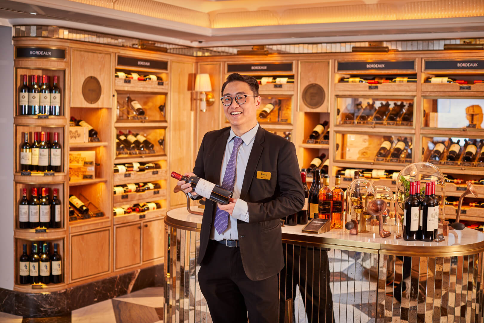 a businessman in a suit at a winery