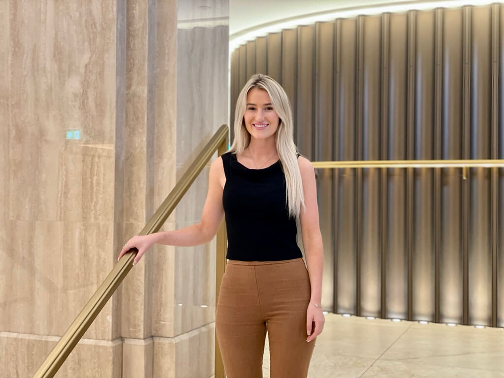 blonde woman on the stairs