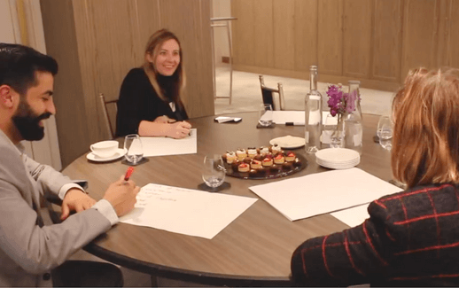 a group of harrods employees at a meeting