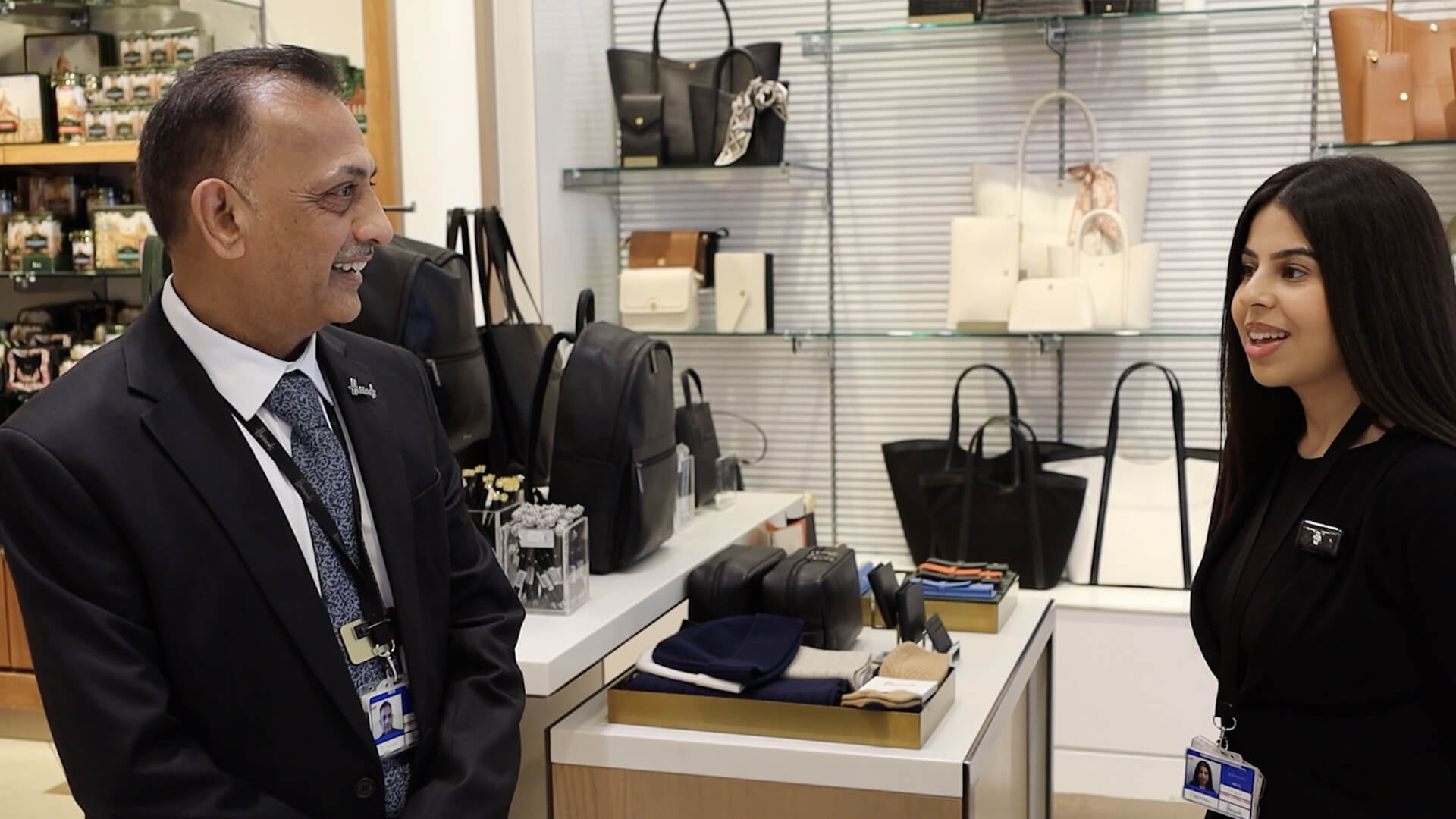 image of harrods airport staff smiling 