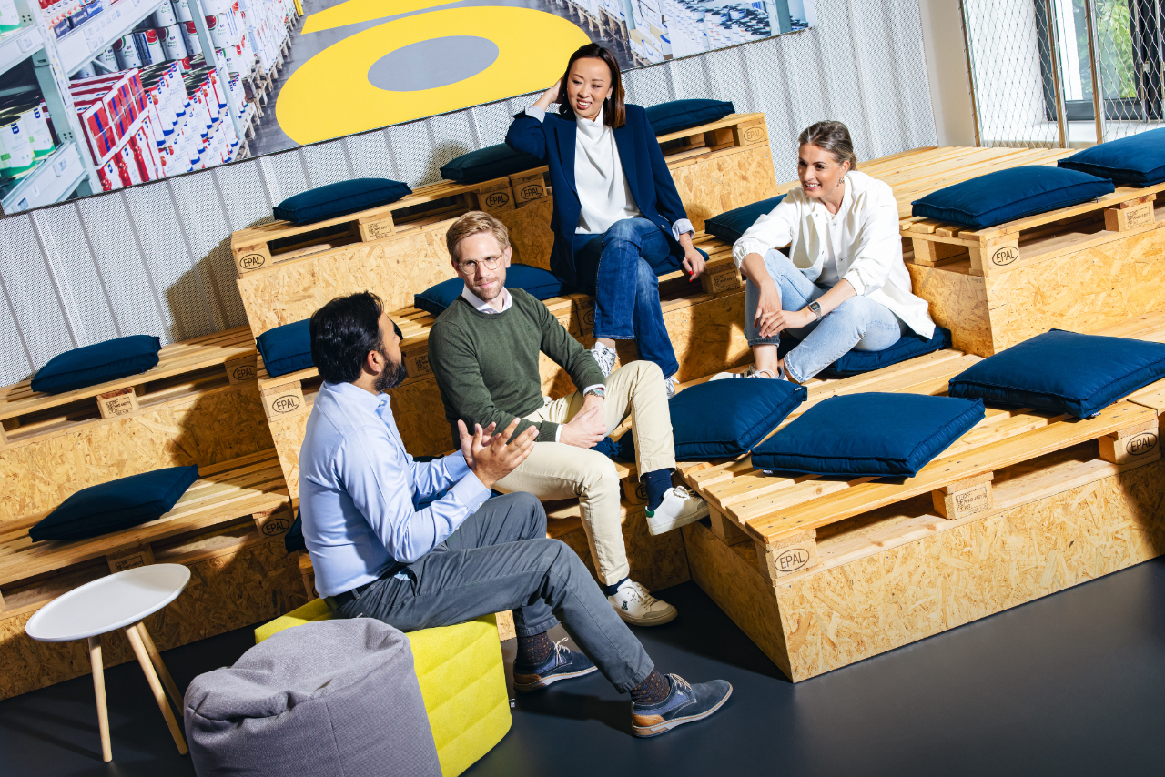 a diverse group of professionals engaged in an animated conversation