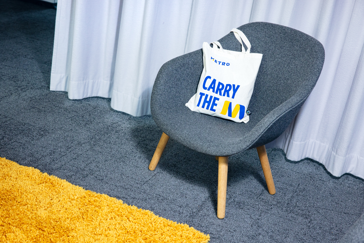 company branded bag placed over a chair