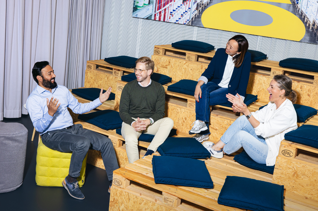 a group of professionals having an animated conversation