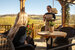 Sunny summer day with a waitress serving a cold drink to a customer 