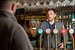 Pub Manager at Greene King serving drinks behind the bar