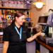 Apprentice learning how to make a coffee at a Greene King pub