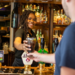Apprentice behind the bar at Greene King