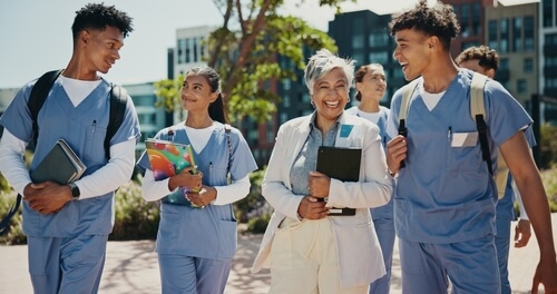 students with professor at AUC