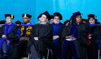 listening at a Walden graduation
