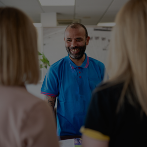 Image of a receptionist speaking with guests