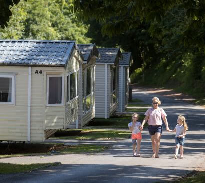 Family walking through Torquay Holiday Park