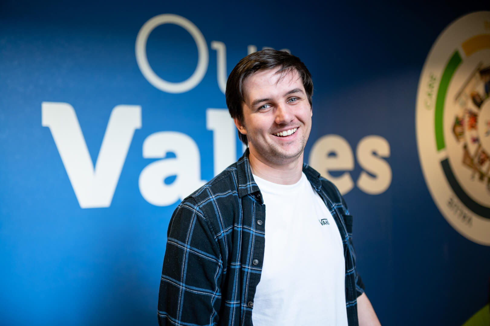 man smiling in the parkdean office