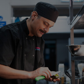 Image of a chef scooping out an avocado