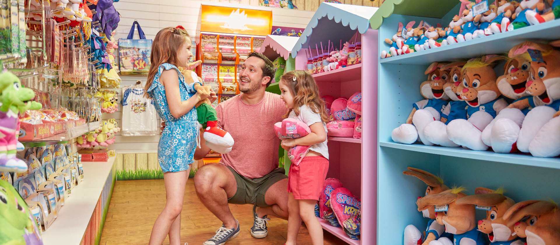 Image of a family shopping for toys in a store