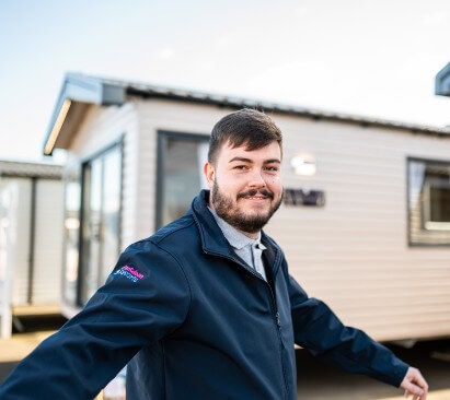 Image of Sales professional outside of a holiday home
