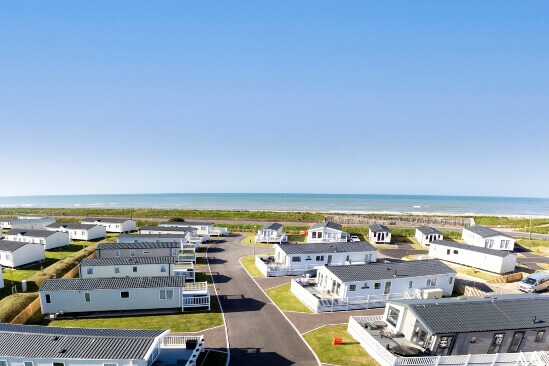 image from above of camber sands holiday park and beach