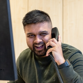 Image of man on the phone in an office