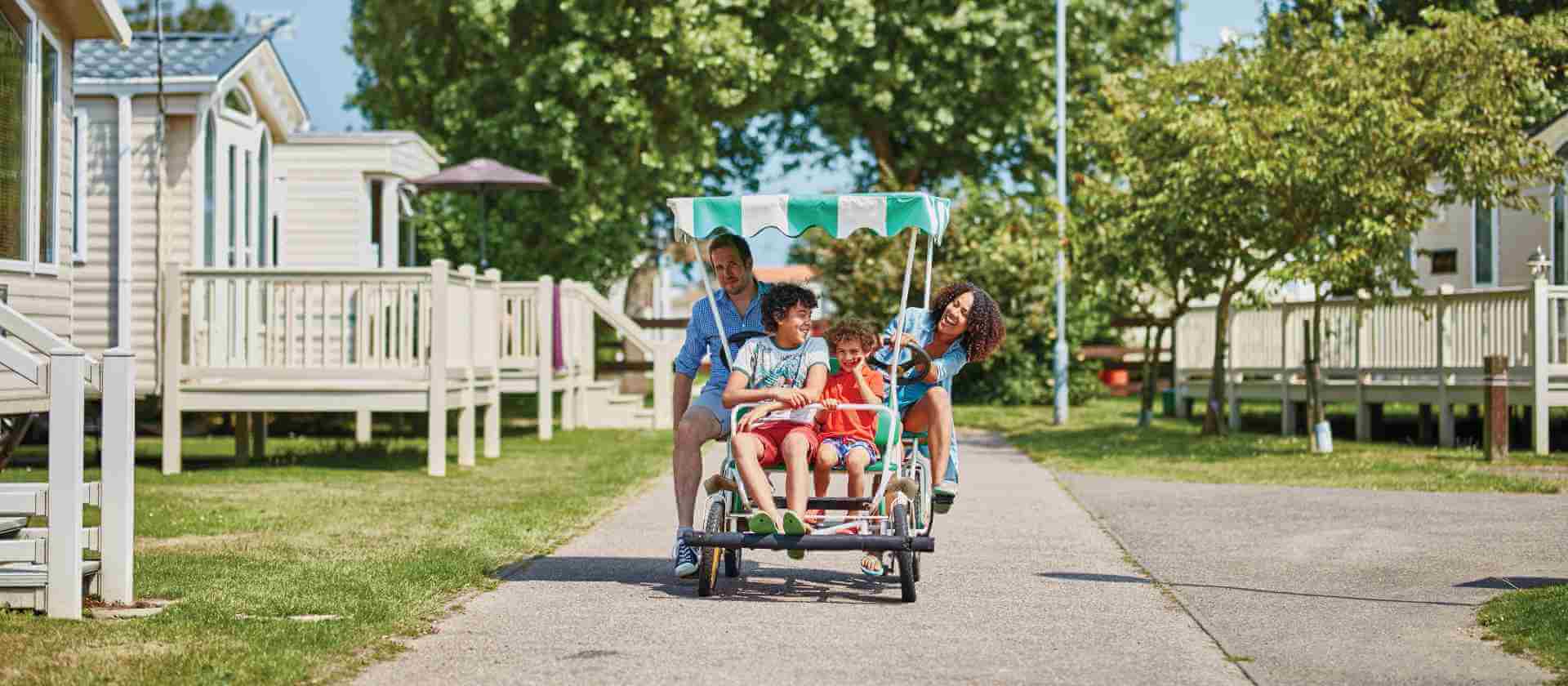 image of a family walking through California Cliffs Holiday Park