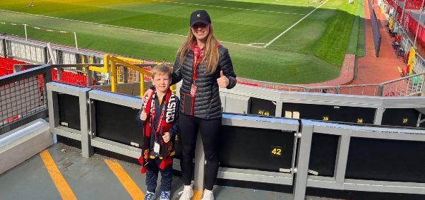 Image of Kelsy at a football stadium