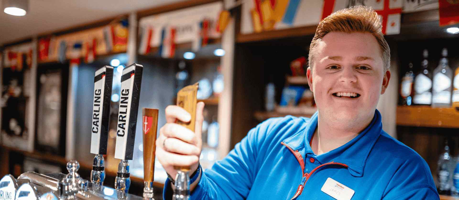 Image of man pulling at pint